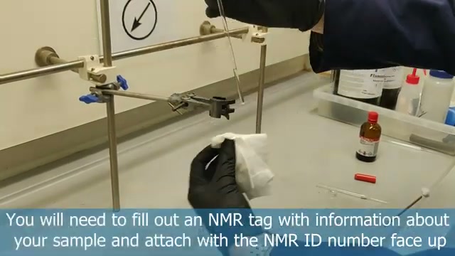 Wiping an NMR tube